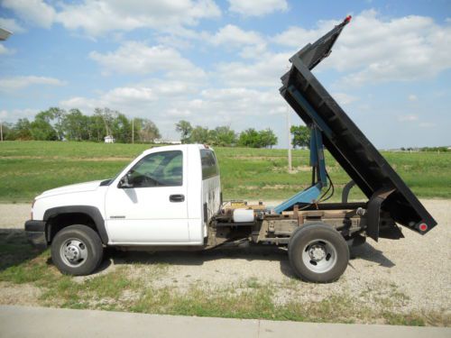 No reserve    flat bed with lift dump, low miles      no reserve