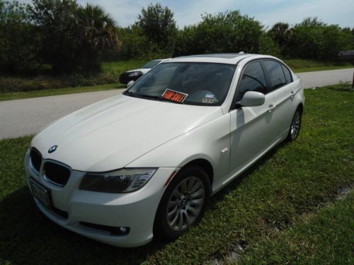 2009 bmw 328i 3.0 4 door (white) immaculate inside and out, one owner