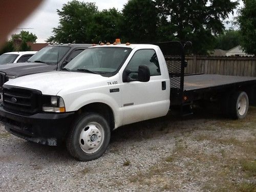 2005 f-550 xl 4x4 16' flatbed 6.0 ltr diesel 74k miles automatic with cold air