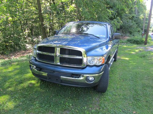 2004 dodge ram 2500 quad cab 4x4 with 8 ft bed with pop up goose neck hitch