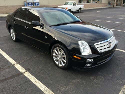 Cadillac sts-4  black 4 awd - luxury and performance package!