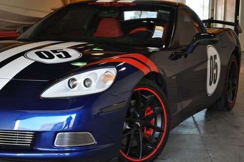 2005 chevrolet corvette  custom lemans blue, racing stripes, red leather nav hud