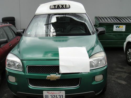 Green / white x taxi wheelchair accessbile mini van