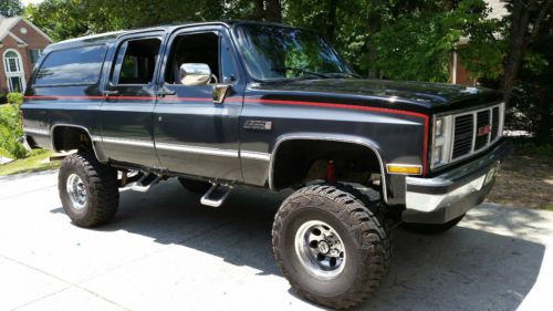 Lifted 1987 gmc suburban, new wheels and tires, no rust and low miles