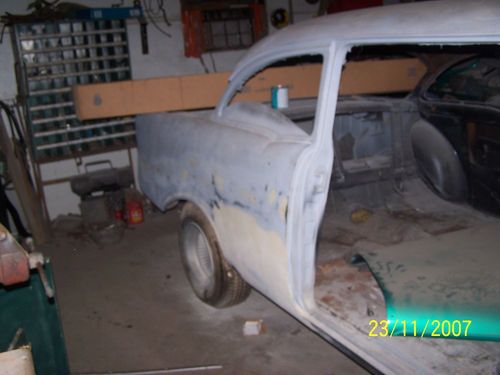 1956 chevy 2 door post rolling chassy w/parts