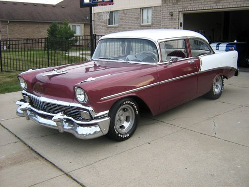Very clean 1956 two door,  350 v8 - red / white interior- new disc brakes- sharp