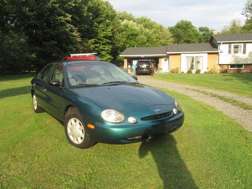 1997 ford taurus low miles perdect running, driving, and no reserve! $.01 start