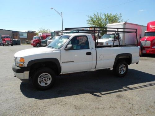 2001 gmc 2500hd pick up with pipe rack and tommy gate