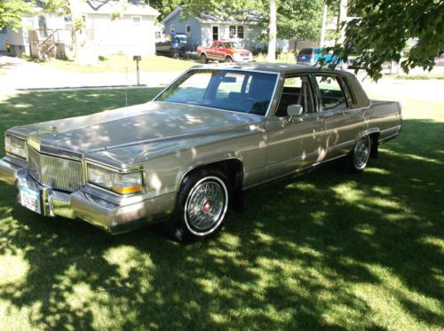 1990 cadillac fleetwood brougham low milage, fully loaded,clean, non smoker.