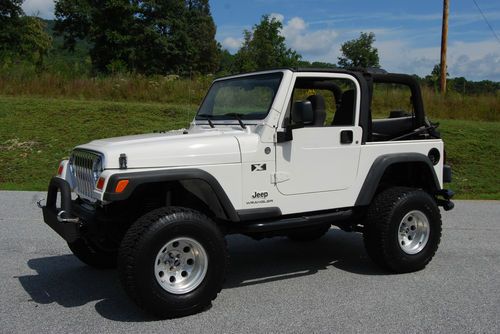 2005 jeep wrangler x - lifted 33" tires 6 cylinder 6 speed manual