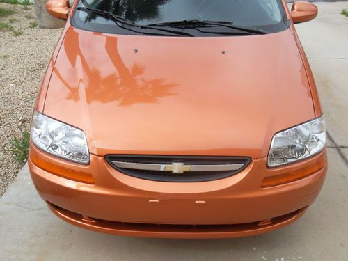 2006 chevy aveo only 25,000 orig. miles wow rare spicy orange color