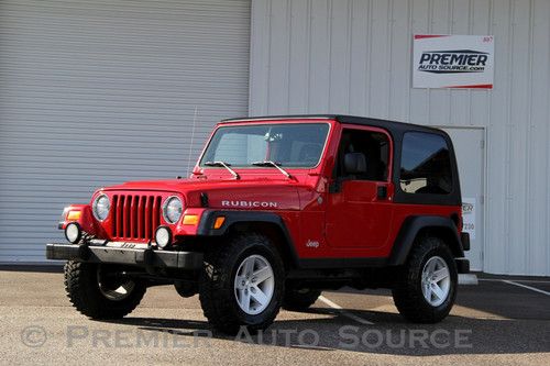 Rubicon,flame red,hard top,5 spd,brand new goodyear mt/r tires,1 owner,low miles