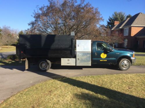 Ford f450 4x4 dump truck with tools boxes and lift gate