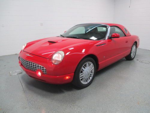 03 red ford thunderbird v8 5 speed auto w/ select shift
