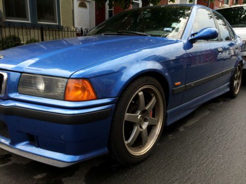 1998 bmw m3 sedan. very fast, well maintained