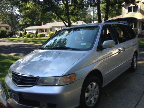 2002 silver honda odyssey ex, mint condition, towing hitch, roof rack,
