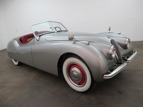 1953 jaguar xk 120 roadster, solid undercarriage, and comes w/ skirts