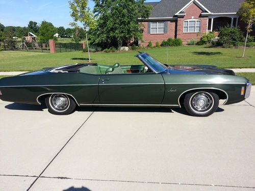 Chevrolet vintage green convertible with white top stock, no reserve clean title