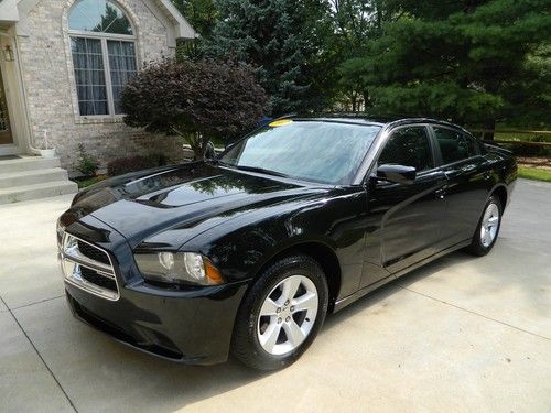 2012 dodge charger 3.6 v6 only 5,700 miles! a black beauty! absolutely like new!