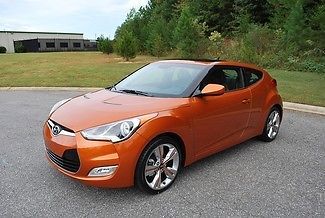 2013 hyundai veloster orange 6spd ,pano roof,navi  as new in and out low reserve