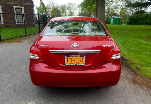 2007 toyota yaris low mileage 4 door in red color under 24k miles