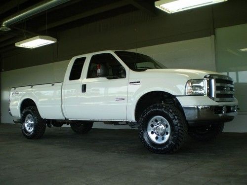 2005 ford f250 supercab 4wd 6.0l diesel auto 35 inch tires 62k nice