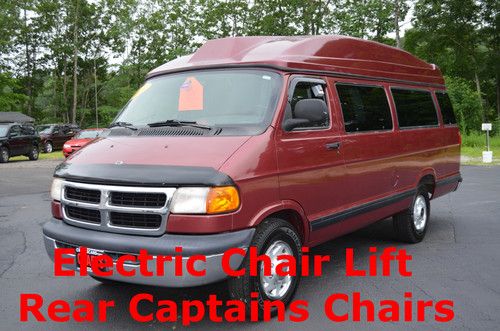 2000 b3500 ram van . power chair lift. high top. rear captains chairs. nice van