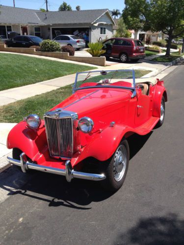1953 mgtd - red with tan leather interior, great shape