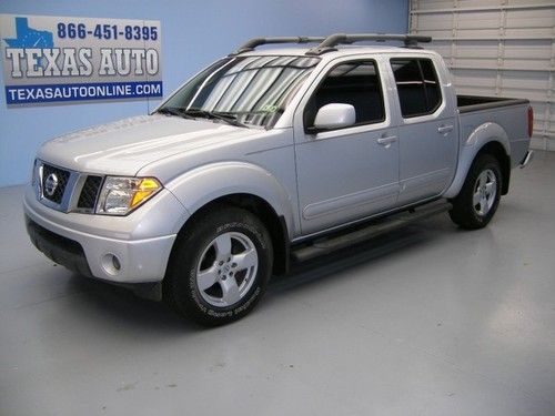We finance!!!  2008 nissan frontier le auto heated leather a/c tow cd 17 rims!!