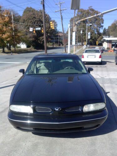 Blue sedan, 4 speed automatic transmission, in  very good  condition.