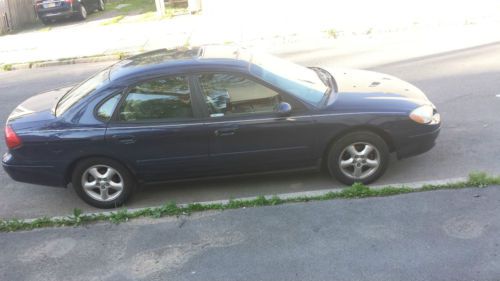 Blue,ford,sedan,taurus,cruise control,automatic,low mileage,good condition,great