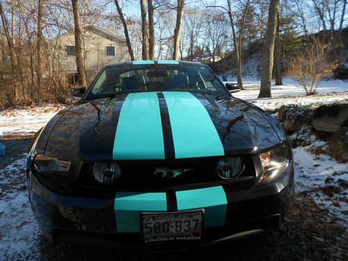 2011 gt mustang 5.0 premium package  black with blue strips,showroom condition