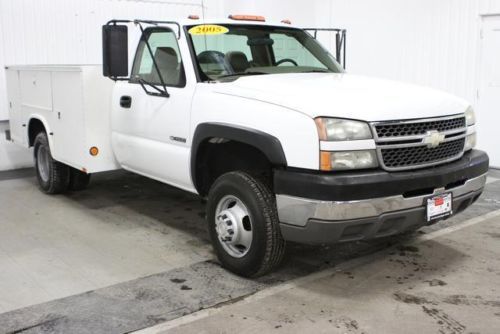 Used 05&#039; low miles, 4x2,  utility body ready for work. save. nice big truck