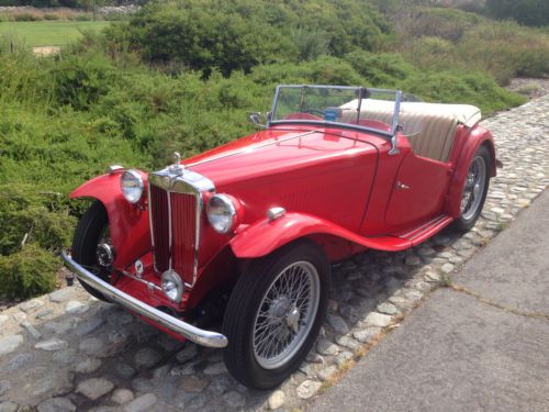 1949 mg tc red/tan. 4-speed. wire wheels. rhd. excellent driver. older resto.