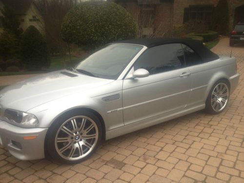 Silver/black convertible loaded, nav, smg superb cond. 44,600 miles
