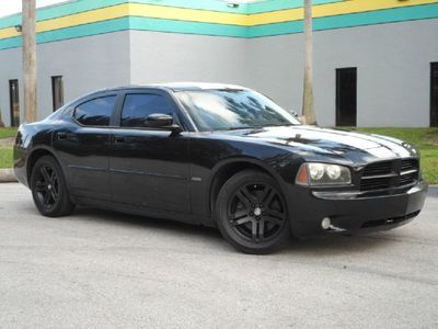 R/t v8 5.7l hemi black with white rally stripes over white leather seats