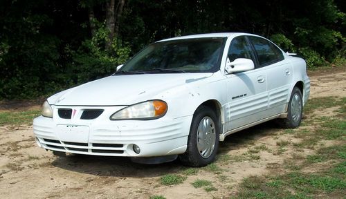 1999 pontiac grand am -  4 door, 4 cyc 2.4 l, white sedan car