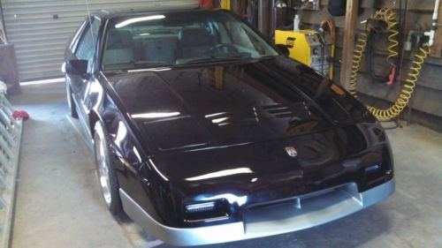 85 fiero gt with 4.9 cadillac v8. show condition. black w/ silver groundeffects