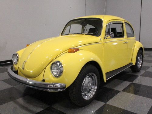 Sunny yellow super beetle, nicely preserved, highly accurate, staggered stance