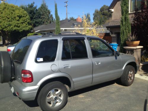2002 silver kia sportage great condition- only 73,420 miles!