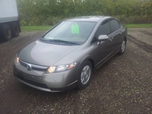 ----- 2008 honda civic hybrid ------ new tires --- clean carfax --- no accidents