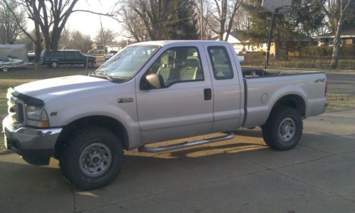 02 f-250, ext. cab, silver, 4x4, 81,000 mi, like new condition