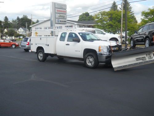 Extended cab 8 foot reading box, ladder racks and plow. low miles, like new.