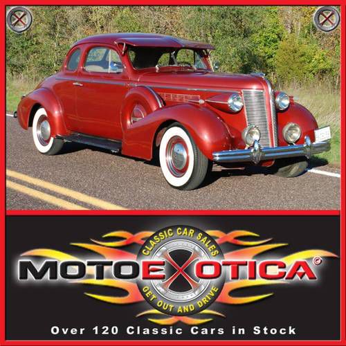 1937 special sport coupe, opera seating, dual side mounts, visor, heater
