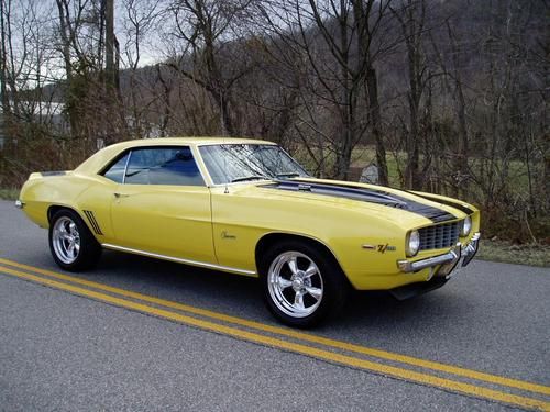 1969 chevrolet camaro z28.. factory daytona yellow. 1 awesome car ..