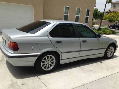Where is the battery in a 1997 bmw 328i #7