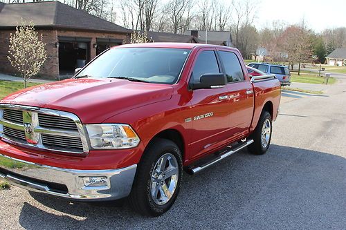 Red dodge ram big horn four wheel drive 22,432 miles with factory warranty