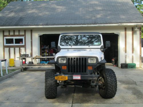 1988 jeep wrangler with 6 inch lift, 33 inch micky thompson tires,