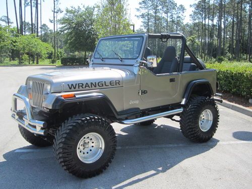 Awesome v8 jeep wrangler . lifted!! super nice jeep w/ all the goodies!!