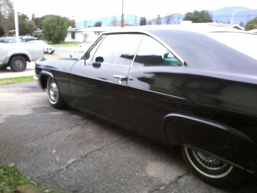 1966 impala 2 door coupe, black, no rust, california car, straight body,no dents